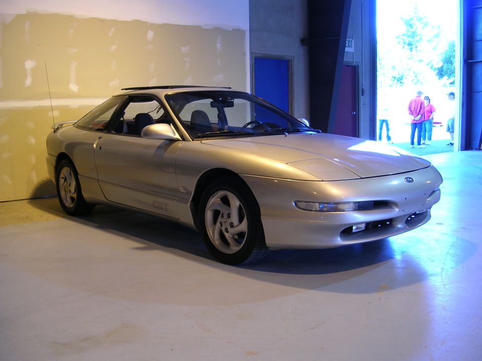 Silver 1996 Ford Probe GT parked indoors with a sunroof