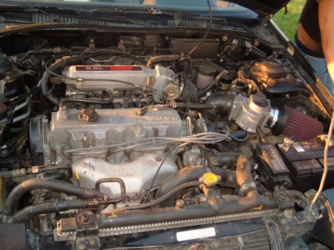 1991 Ford Probe - Engine bay detail showing the motor and associated parts, with visible text labels.