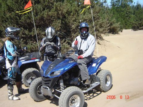 1993 Ford Bronco - Three individuals on ATVs enjoy a day at the Coos Bay Dunes on August 13, 2006.