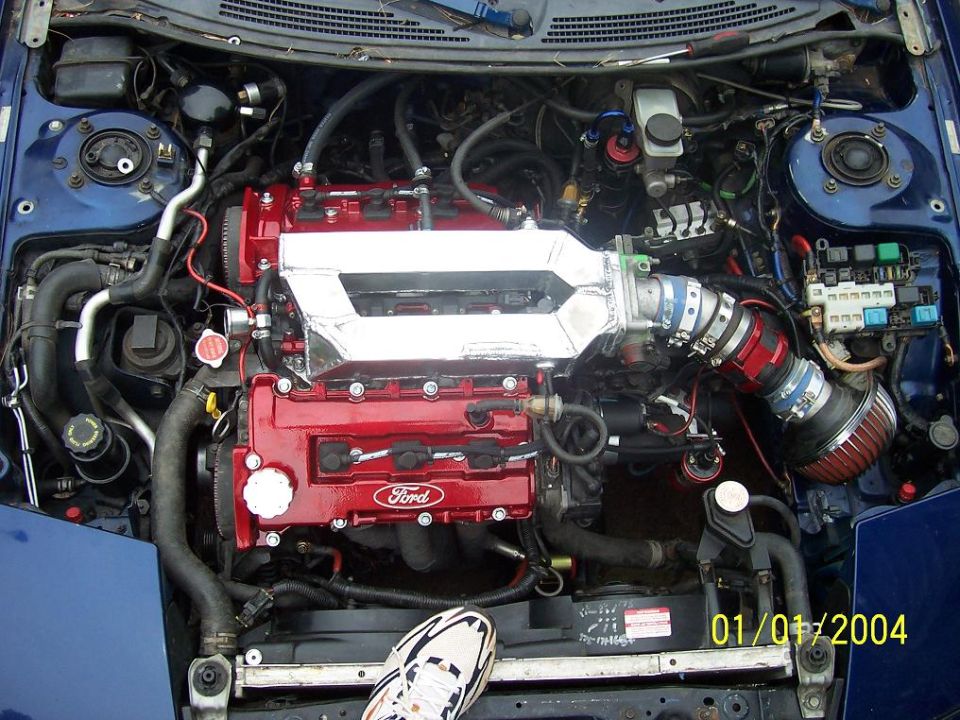 Ford Probe V6 engine bay with red Ford valve covers, polished intake plenum and red cone filter