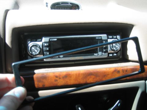 1996 Ford Bronco - first take the cd player out and connect the wire and drop it down through the bottom of the dash