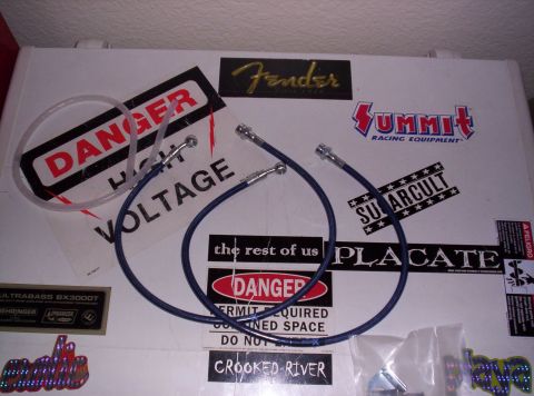 1995 Ford Bronco - The photo shows two blue brake lines and various stickers, not a 1995 Ford Bronco.