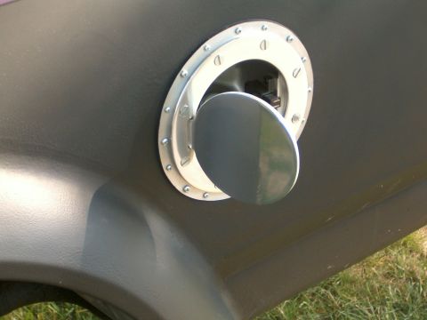 1989 Ford Bronco - Chevy billet gas cover.....had to cut a bigger mounting plate.....round cover square hole....and glassed on flare