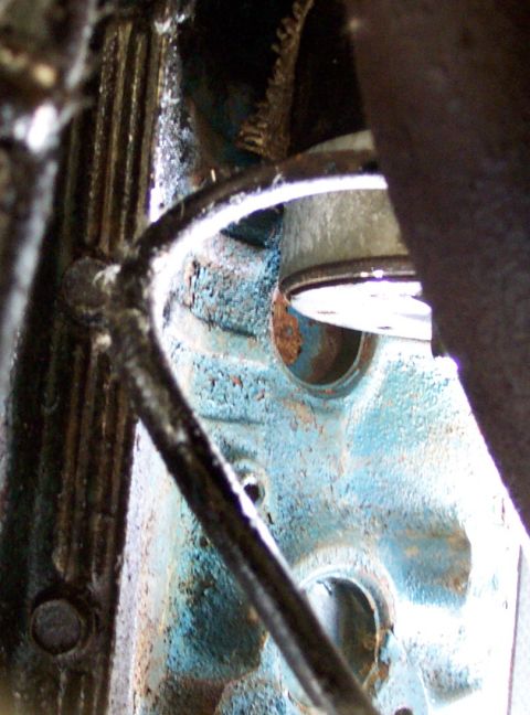 1975 Ford F-150 - Engine block detail showing wear and rust.