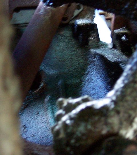 1975 Ford F-150 - A blurry view of engine components, possibly from a truck, with visible text at the bottom right.