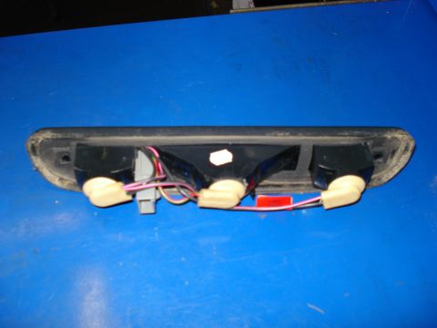 1994 Ford Bronco - This is a third brake light assembly, likely from an older SUV, showing its internal wiring and bulb sockets.