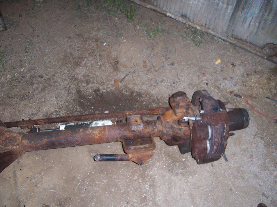 Rusty Dana 60 axle assembly with brake caliper