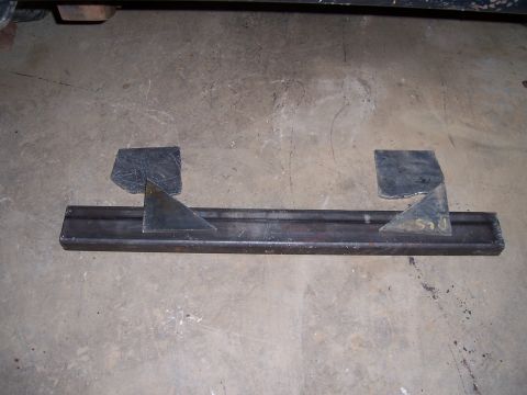 1983 Ford Bronco - Custom fabricated metal part with welded brackets, likely for automotive use.