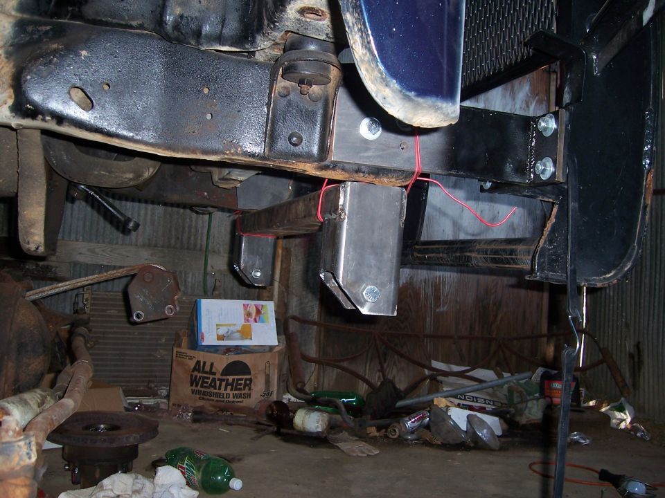 Front crossmember and bumper brackets with red wires