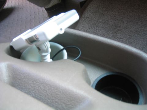 1996 Ford Bronco - drill a hole in the bottom of the center console and i also drilled a hole in the bottom of my cupholder...then put everything back together