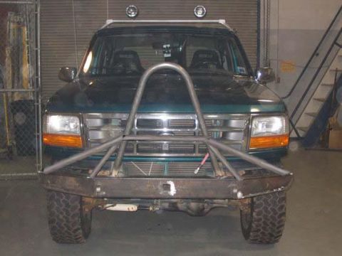 1996 Ford Bronco - This Ford Bronco has a custom front bumper and roll cage, obscuring some of its original features.
