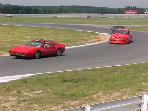 2000 Ford Mustang - '00R chasing down a ferrari