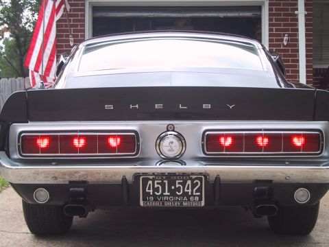 1968 Shelby GT500 - The rear of a 1968 Shelby GT500 shows its distinctive sequential tail lights and Shelby badging.