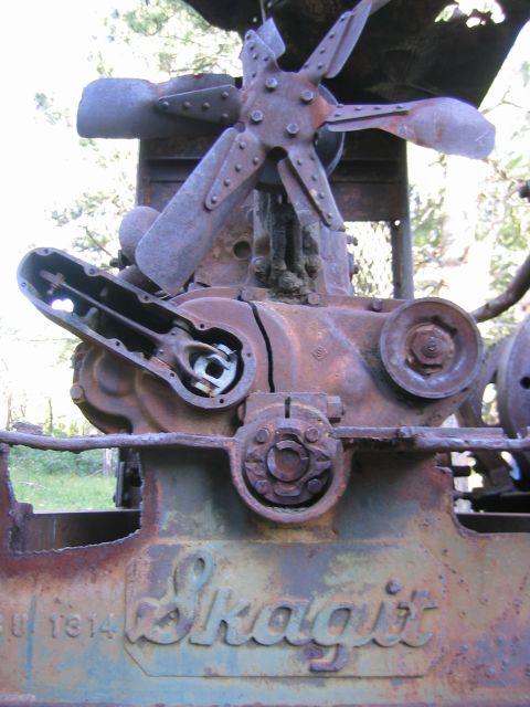 1997 Jeep TJ - Close-up of a heavily rusted engine component, possibly from a Skagit 1914 machine.