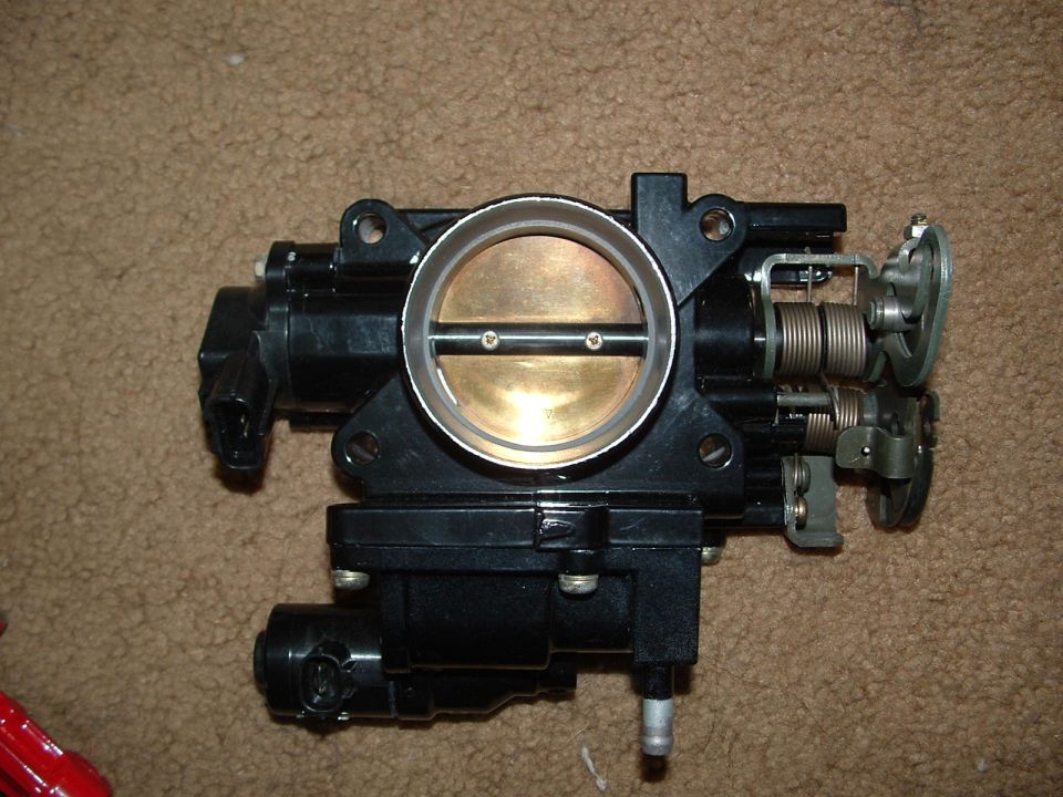throttle body assembly with butterfly valve and springs