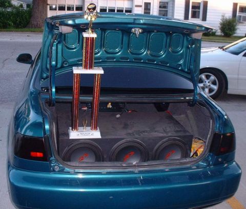 2006 Ford E350 - James' Civic. Won first place in his class with 3 TypeR 10"s and a 2000wt. HiFonics amp, with a custom built box and Optima battery.