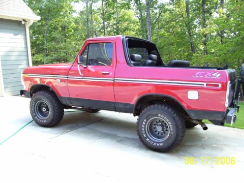 1979 Ford Bronco - This 1979 Ford Bronco is shown from the side, its FX4 off-road package and a removable top.