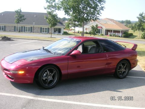 1993 Ford Probe - This 1993 Ford Probe GT has a custom black hood and a rear spoiler.