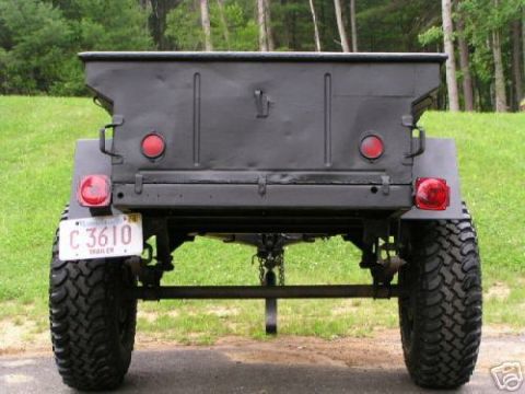 1991 Ford Bronco - This trailer features large off-road tires and a utilitarian black finish, with a visible license plate.