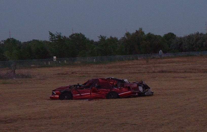 Completely destroyed car we found outside our motel in North Platte, NE. No idea how it got there...