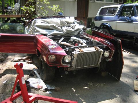 1969 Ford Mustang - This 1969 Ford Mustang is undergoing engine work, with its front end disassembled.