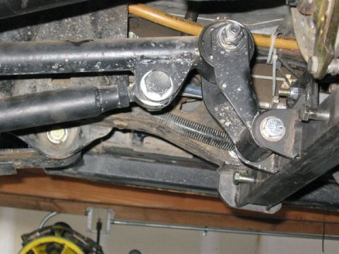 1994 Ford Bronco - Underside view of complex suspension and steering components, including linkages and springs.