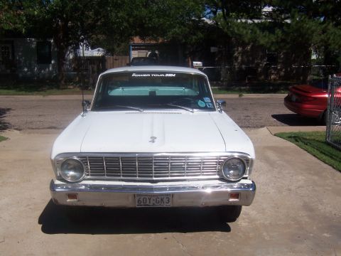 1964 Ford Ranchero - Front view of a white 1964 Ford Ranchero parked in a driveway.