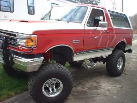 1989 Ford Bronco - This lifted 1987 Ford Bronco is modified with large off-road tires and a custom front bumper.