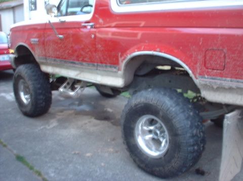 1989 Ford Bronco - old 36's on it and some mud on it