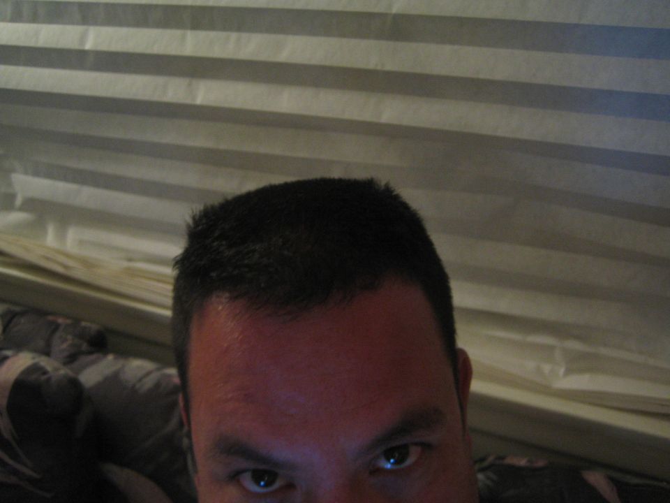 Man's face, close-up, looking at the camera