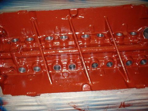 1967 Ford Fairlane - A red engine block is shown, with visible casting numbers indicating its origin.