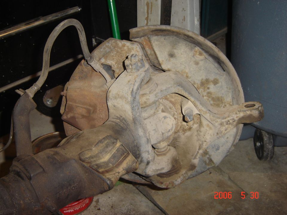 Front axle assembly with brake components