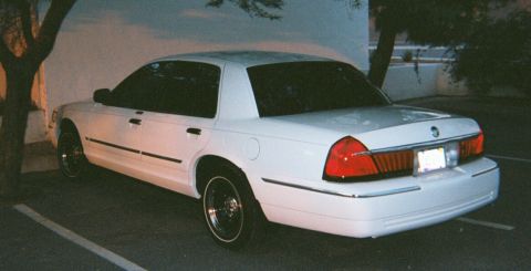 2001 Mercury Grand Marquis - This 2001 Mercury Grand Marquis is seen from the rear in a parking lot.