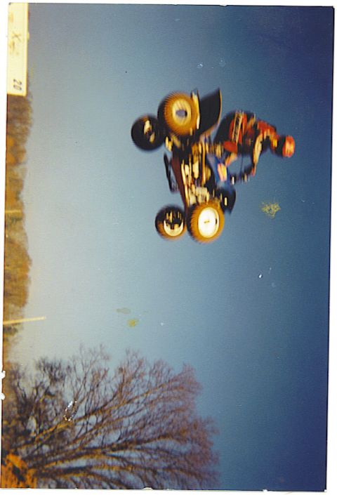 1992 Ford Mustang - A remote control car is captured mid-air during a jump.