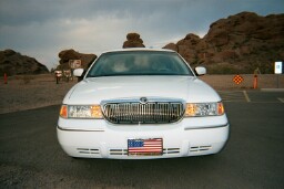 2001 Mercury Grand Marquis - Front view of a white 2001 Mercury Grand Marquis parked outdoors.