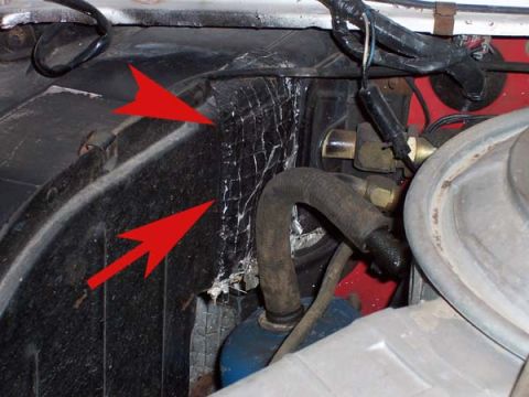 1978 Ford Bronco - Detail shot of engine bay components, including hoses and insulation, with red arrows highlighting specific areas.