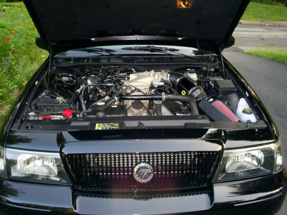 2003 Mercury Marauder engine bay with aftermarket intake