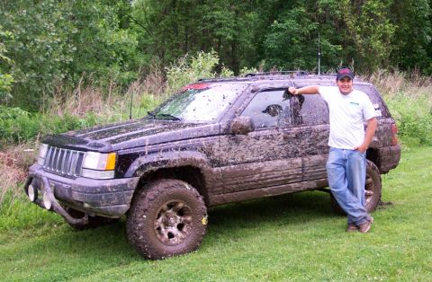 1978 Ford Bronco - This Jeep Grand Cherokee is covered in mud after an off-road excursion.