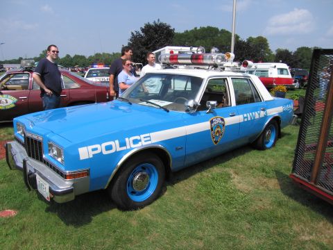 2001 Ford Crown Victoria - This police car appears to be from the late 1970s, not a 2001 model.