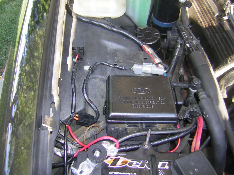 Ford engine bay power distribution box and battery wiring detail