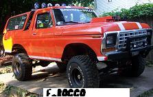 1978 Ford Bronco - This modified 1978 Ford Bronco features a lifted suspension and off-road tires, with racing stripes adorning its hood and roof.