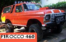 1978 Ford Bronco - This orange 1978 Ford Bronco features racing stripes and a lifted suspension, indicating it's ready for off-road adventures.