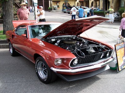 1972 Ford Ranchero - Red 1969 Ford Mustang Mach 1 on display with hood open.