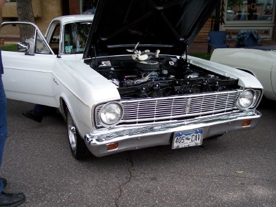 1972 Ford Ranchero - White 1965 Ford Falcon Ranchero with hood open, displaying its engine. The license plate reads 405-CAV.