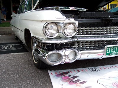 1972 Ford Ranchero - Front view of a 1959 Cadillac, showing its distinctive grille and headlights. License plate is visible.
