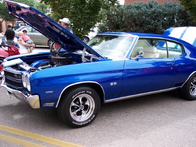 1972 Ford Ranchero - A blue 1970 Chevrolet Chevelle SS is displayed with its hood open, revealing the engine bay.