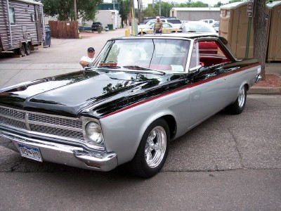 1972 Ford Ranchero - This two-tone coupe has a distinctive body style and chrome wheels.