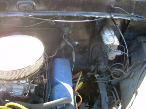 1971 Ford F-100 - Close-up view of the engine bay, showing various components and wiring.