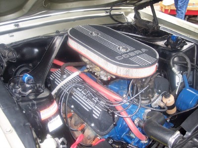 1972 Ford Ranchero - The engine bay of a 1972 Ford Ranchero shows a Cobra air cleaner and blue Ford engine block.