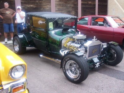 1972 Ford Ranchero - Custom hot rod coupe with flame paint and V8 engine, parked next to other vehicles.